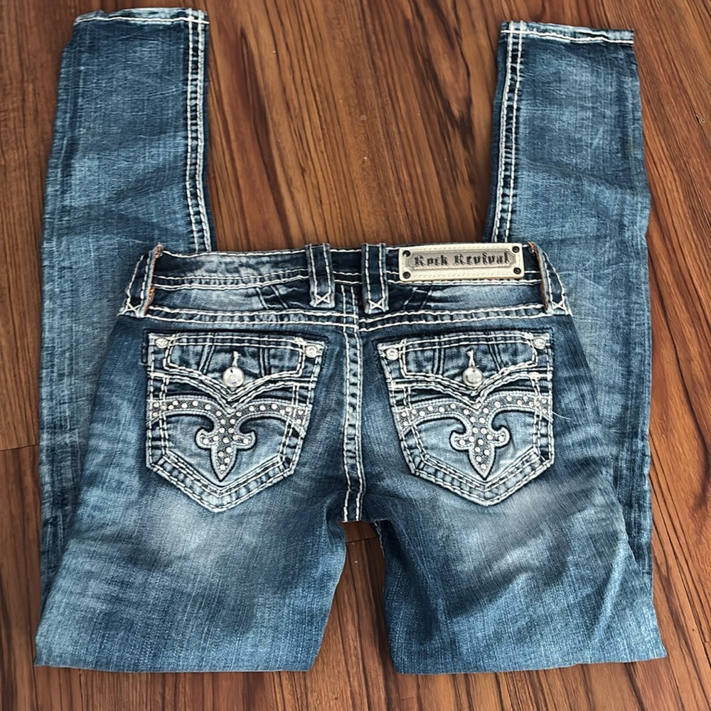 Rock Revival Light Blue Acid Wash Jeans with Embellished Back Pockets